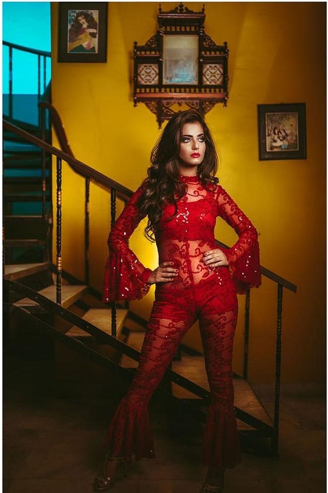 Vij sets temperatures soaring in this sheer lace jumpsuit with her makeup showing off her bold side. 