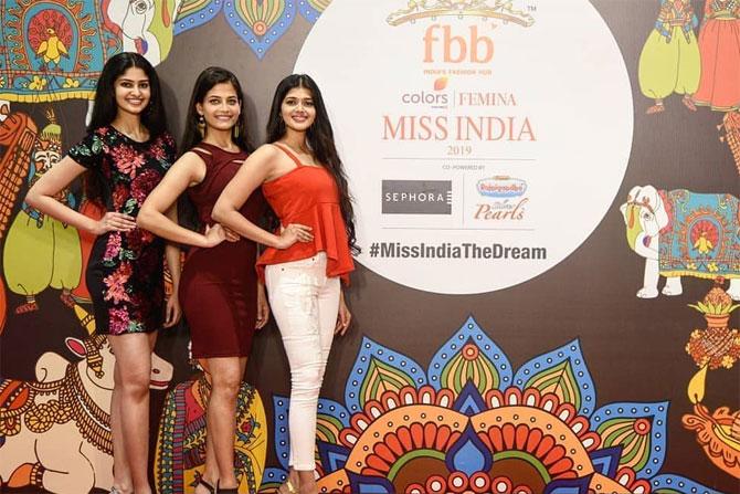 In yet another picture with her fellow contestants from the Miss Telangana competition, she looks graceful in this thigh-high dress with her hair let loose.  