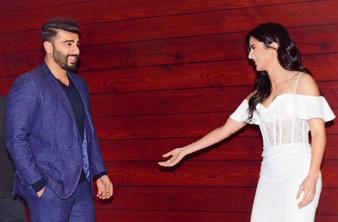 Is actor Katrina Kaif coaxing Arjun Kapoor to join her on the dance floor at Javed Akhtar's birthday party in Bandra? Pic/Bipin Kokate