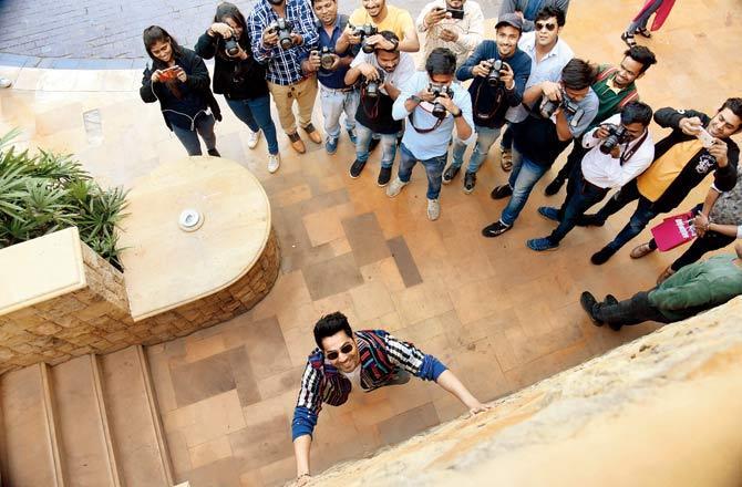 Varun Dhawan turns his back on the others and focuses on the mid-day photographer at a five-star in Juhu. Pic/Sameer Markande