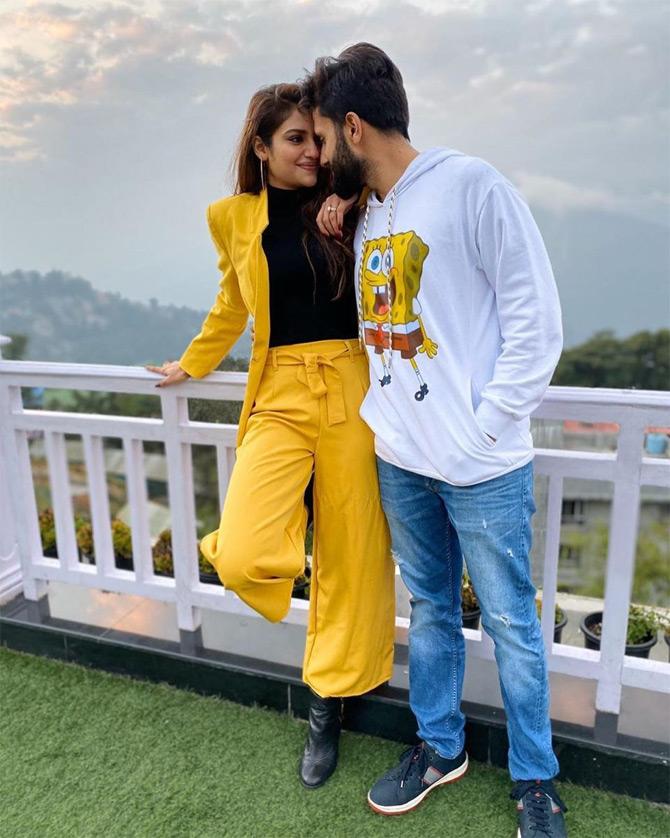 Nusrat Jahan shared this picture from one of her travel diaries. In the picture, Nusrat Jahan and Nikhil Jain spell romance in this love-filled photo as the two twin in hues of yellow. Nusrat can be seen in a yellow pantsuit with black inners. While sharing this lovey-dovey picture, Nusrat wrote: And suddenly all the love songs were about u.. times when I need u..?? Now and forever..!