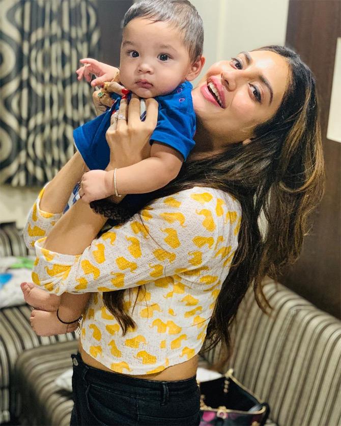 The new-age political leader from Kolkata loves to spend quality time with kids. Nusrat, who is loved by people across all walks of life, is quite fond of children. Nusrat shared this adorable picture from her babysitting sessions where she can be seen enjoying her playtime as a babysitter. Donning a yellow top paired with denim, Nusrat picks the child as she tries to replicate 'The Lion King' pose.