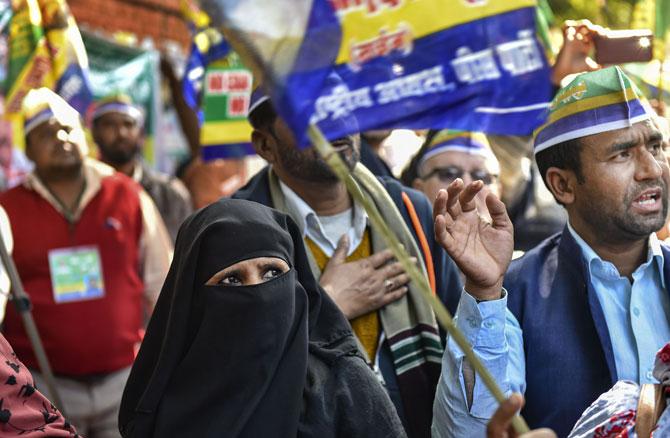 Anti-CAA protesters at Shaheen Bagh, had called for a march till Union Home Minister Amit Shah's residence on February 16, but did not receive permission from the Delhi Police. In a letter to the protesters, the New Delhi district police said the march will pass through two more districts and request for it has been sent to the police headquarters for further appropriate actions. The protestors had to postpone the march after the police asked them to do so. (Picture/ PTI)