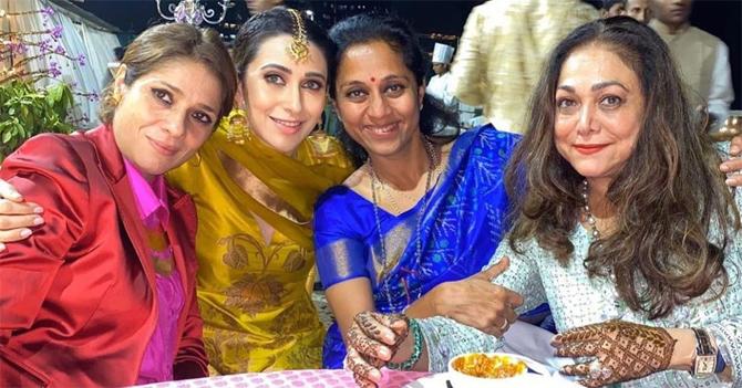 In photo: Supriya Sule caught in a candid conversation with Karisma Kapoor, and Tina Ambani at Armaan Jain's mehendi ceremony.