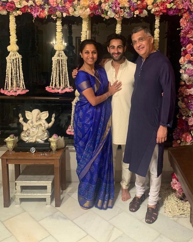 The NCP leader also shared a candid picture with the groom-to-be, Armaan Jain. In the picture, Supriya can be seen posing with her husband Sadanand and Armaan amidst a beautiful floral backdrop. She captioned this one: With our Dulhe Raja - Armaan!