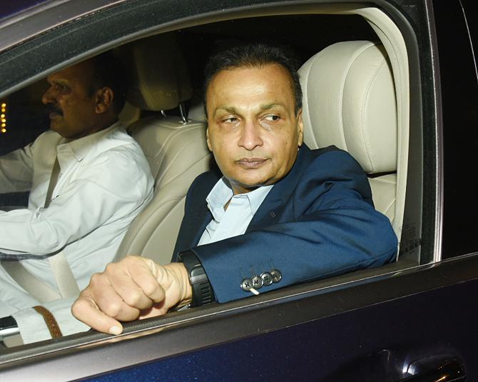 For the mehendi night, Anil Ambani looked suave in a navy blue suit which he paired with a blue shirt and minimal accessories.