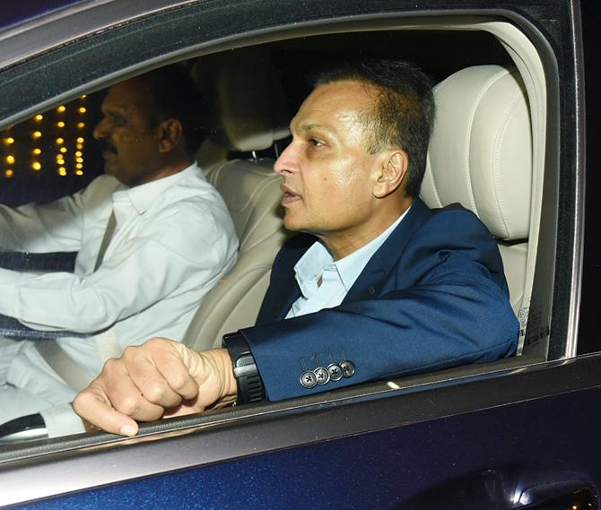 In photo: Anil Ambani caught in a candid moment as he arrives for Armaan Jain's mehendi ceremony.
