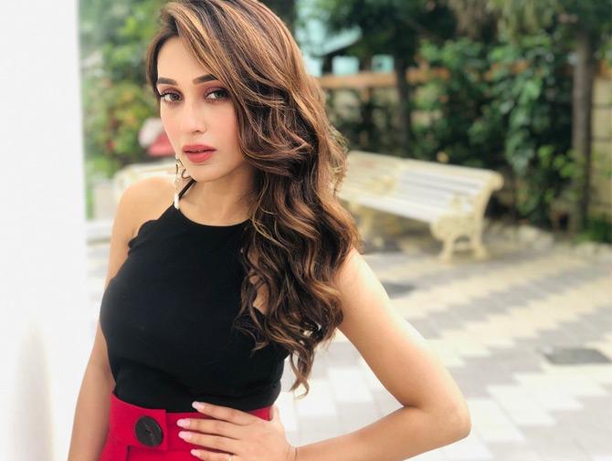 In photo: Mimi Chakraborty oozes confidence in a black and red ensemble as she poses for the lenses