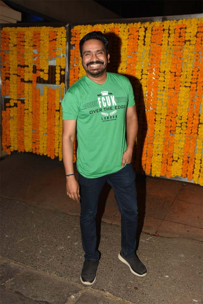 Mushtaq Sheikh, Ekta Kapoor's best friend, was all smiles as he posed for the paparazzi at Shobha Kapoor's birthday bash.