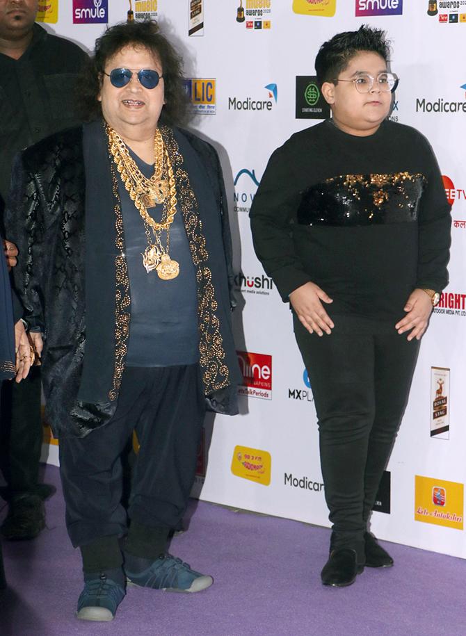 Bappi Lahiri posed with grandson Swastik Bansal at the award function.