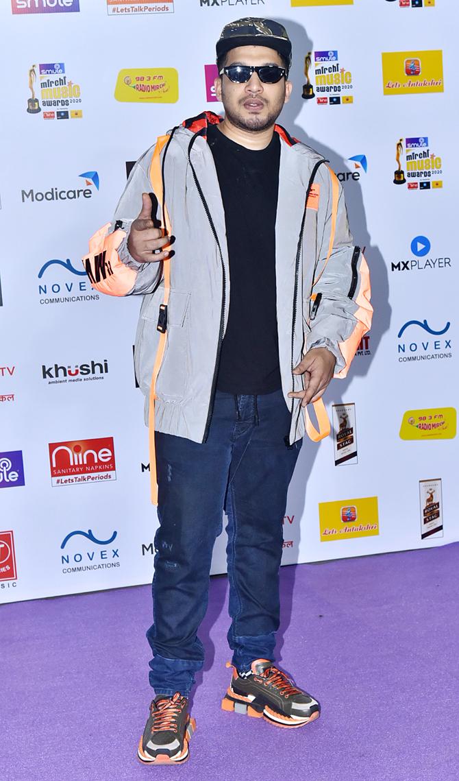 Naezy posed for the shutterbugs as he attended the function hosted in Mumbai.