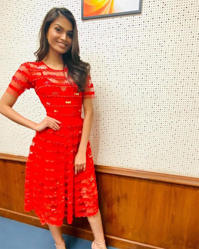 Suman who began pursuing a course in accountancy from the University of Mumbai looks like a diva in this striped knee-length red dress.