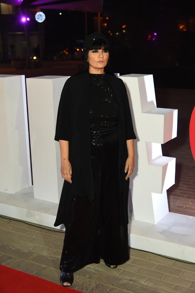Celebrated Bollywood designer Neeta Lulla posed for the shutterbugs as she attended the award function.