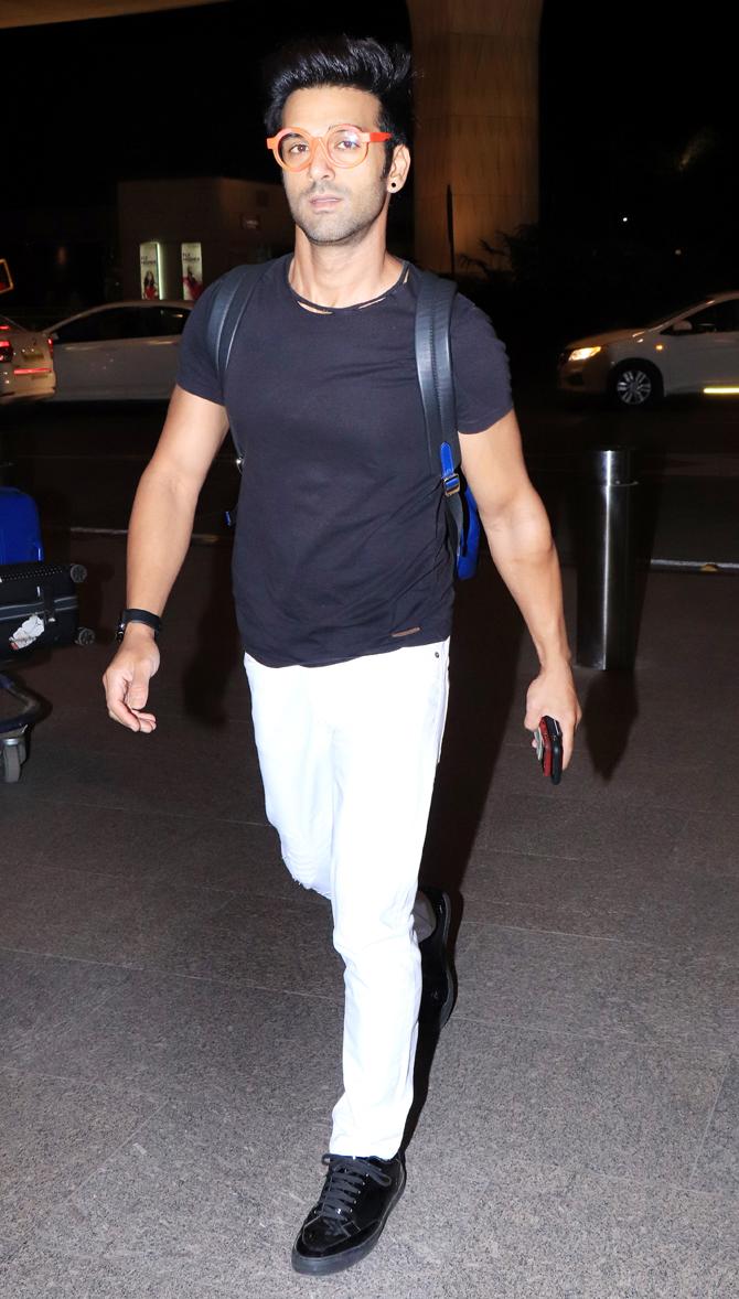 Pulkit Samrat was also snapped at the airport. The actor, who is said to be dating Kriti Kharbande, sported a basic black tee, paired with white pants and funky pair of glasses during the outing.