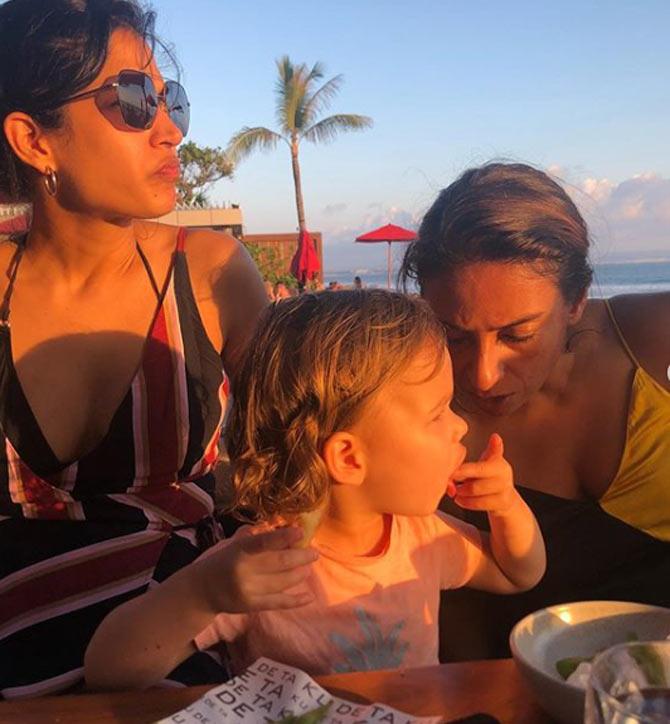 In picture: Shaun Tait's wife Mashoom Singha with her sister Shamita Singha and daughter Wynter at the beach during a holiday