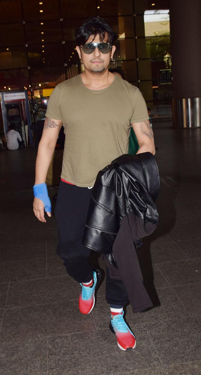 Sonu Nigam was also clicked at the Mumbai airport. The singer was seen wearing a basic tee, paired with black joggers.