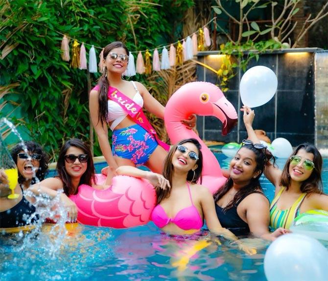 In this one, Krystle D'Souza was seen chilling by the pool with her girl pals.