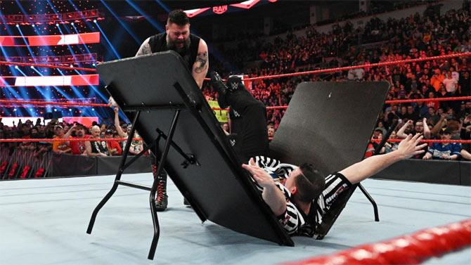 After Randy Orton made his way out, Kevin Owens managed to reveal that the referee was one of Seth Rollins disciples wearing his Monday Night Messiah t-shirt. Rollins then powerbombed the referee onto a table to close WWE Raw