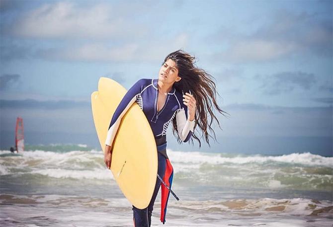 Did you know? Ananya Birla learned swimming as a child. In an interview with mid-day, the Birla scion revealed that post swimming she moved to the gym. The 'Fingerprint' singer also swears by boxing, dancing, pilates, and yoga to stay fit and healthy.
In photo: Ananya Birla shows off her love for surfing with a surfboard on the La Jolla Beach, California.
