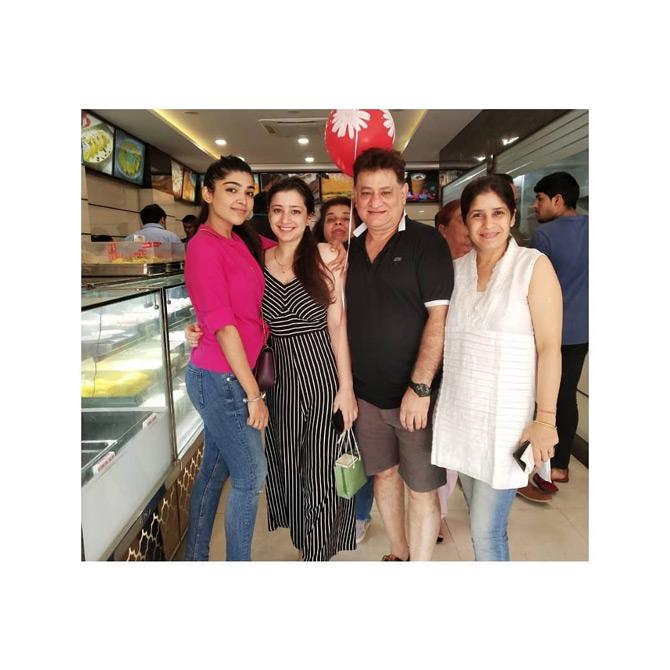 Natasha Gandhi shared this candid picture with her parents and sister Krishika Gandhi. Natasha shared this picture on her 25th birthday celebrations. In the picture, the happy-go-lucky Natasha can be seen bonding with her family. She captions this one: I'm too young to be this old!




