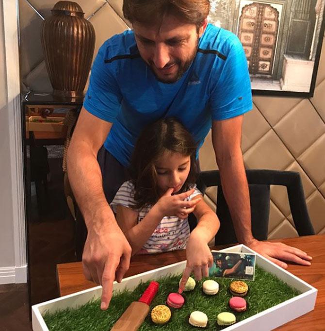 Shahid Afridi has scored 6 centuries and 39 fifties in ODIs at an average of 23.57.
In picture: Shahid Afridi with his daughter