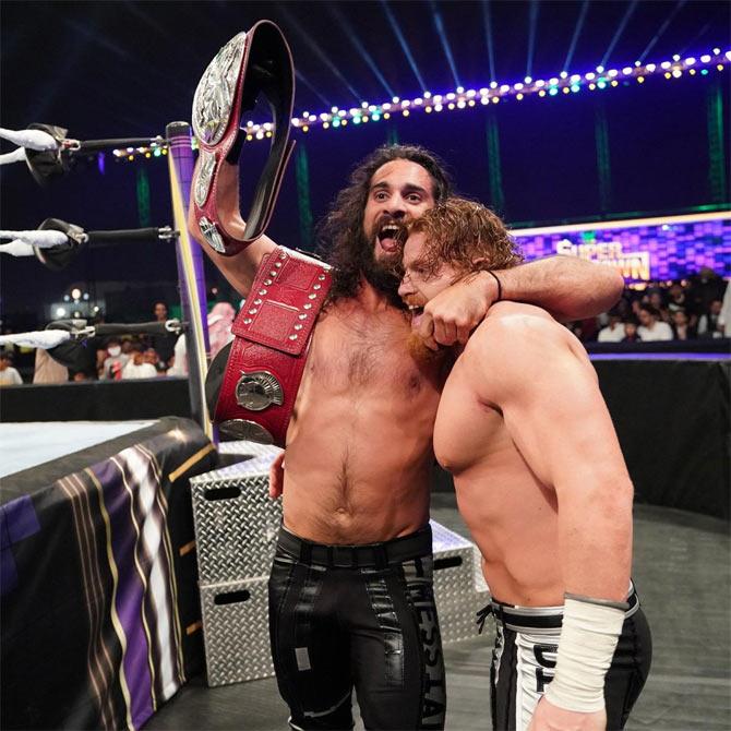 Once again Seth Rollins, with the referee's attention on Murphy, hit the Stomp on Angelo Dawkins after which Murphy pinned him as the Messiah retained the titles.