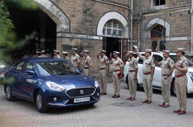 In photo: Outgoing Mumbai Police Commissioner Sanjay Barve gets a final salute as he bids goodbye to the city force