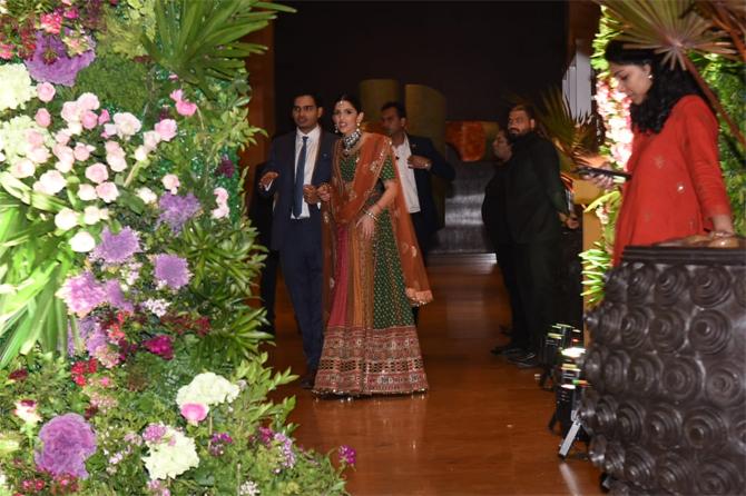 In photo: Akash Ambani's wife Shloka Mehta caught in a candid moment as she arrives for Armaan Jain's grand wedding reception