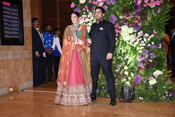 Business tycoon Mukesh Ambani's son Akash Ambani walked in with his wife Shloka Mehta for the grand evening. The power couple oozed elegance and romance when they arrived to bless the newly married couple