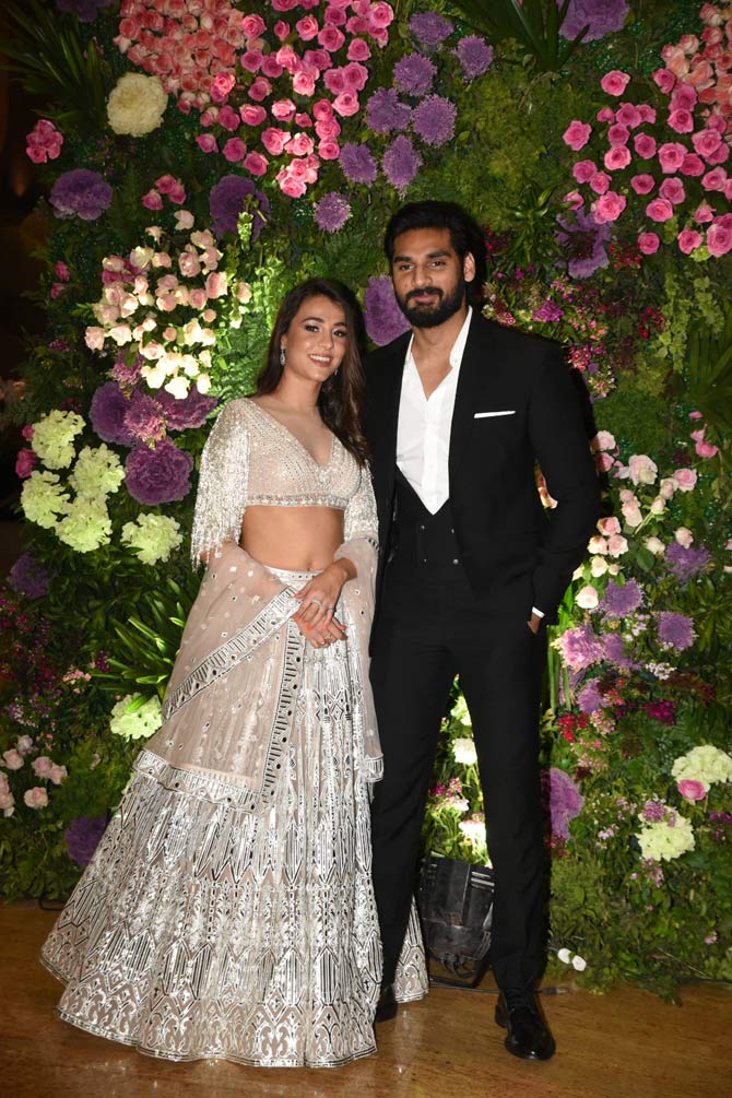 Ahan Shetty, who is all set to make his Bollywood debut opposite Tara Sutaria, attended the reception with girlfriend Tania Shroff.