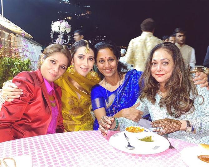 From Ambanis, Bachchans, Thackerays to Khans, the three days affair was attended by many bigwigs of Mumbai.
In picture: Karisma Kapoor with Supriya Sule and Tina Ambani at the Mehendi ceremony.