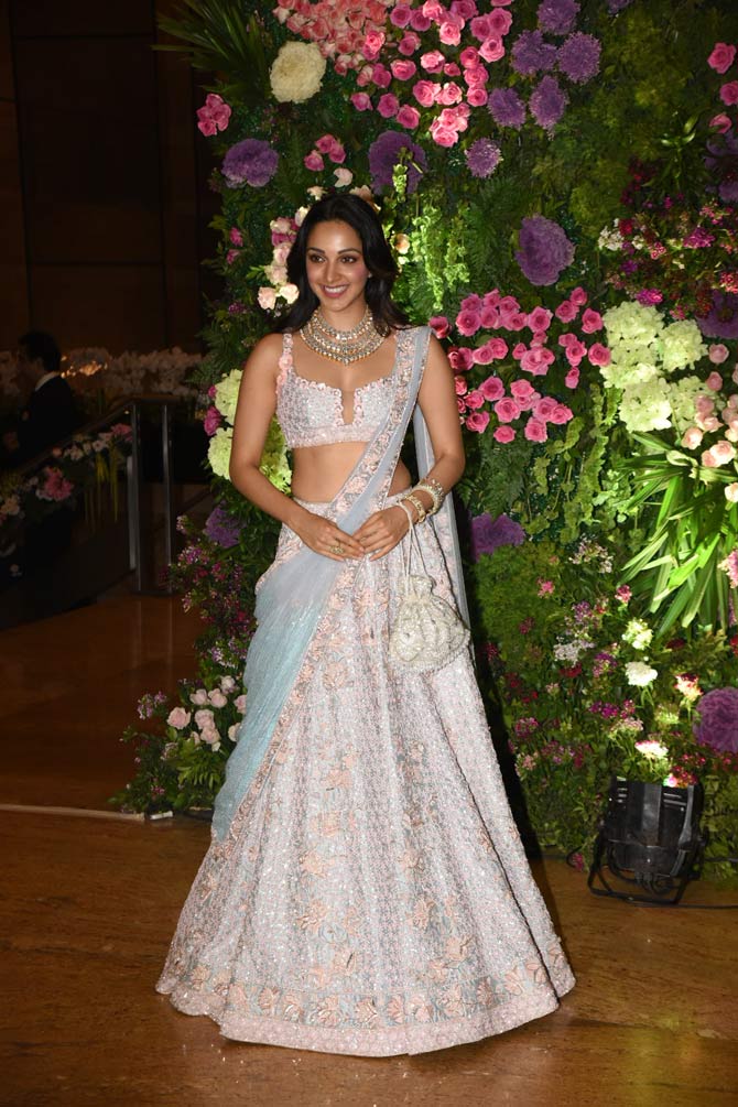 Kiara Advani was all smiles as she attended Anissa Malhotra's reception hosted in the city. Her pink and blue embellished lehenga with a Kundan neckpiece was no less than an ethereal fashion statement.