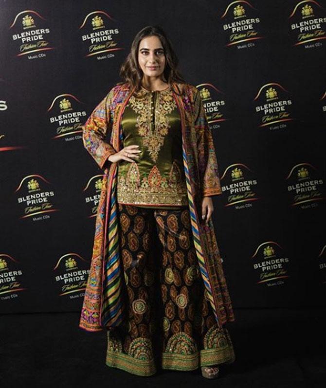 Actress and a social media celebrity Kusha Kapila took on vintage fashion in a short kurta, jacket and palazzos. She also posed with Sandeep Khosla at the event.