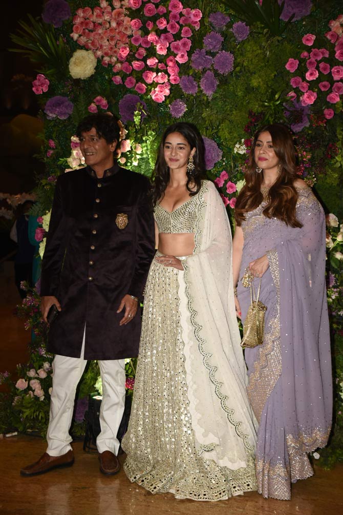 Chunky Panday walked into the wedding reception with daughter Ananya and wife Bhavana Pandey. While Chunky opted for a sherwani, Ananya looked ethereal in white mirror work lehenga during the celebration.