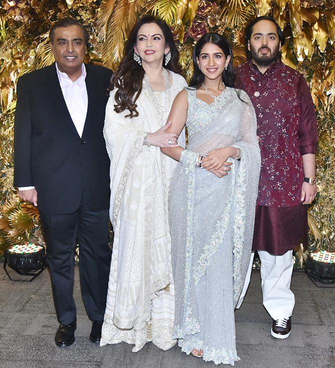 Anant Ambani's friend Radhika Merchant added a splash of colour to the grand wedding bash of Armaan Jain and Anissa Malhotra. Radhika Merchant looked absolutely gorgeous in a sleeveless saree in hues of grey. She complimented her stunning attire with a diamond neckpiece, matching earrings and nude lipstick. Radhika left her long tresses open on both the sides, which gave her a natural look as she was all smiles for the paparazzi.