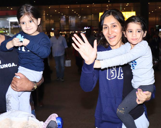 Karanvir Bohra's wife Teejay Sidhu was clicked with her twins - Bella and Vienna at the Mumbai airport. The trio was super excited looking at the paparazzi attention.