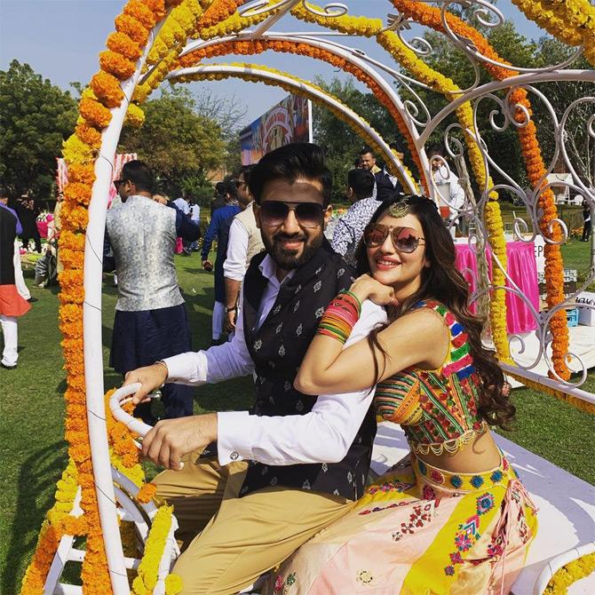 In photo: Nusrat Jahan and Nikhil Jain enjoy riding a beautifully decorated bicycle as they pose for the lenses
