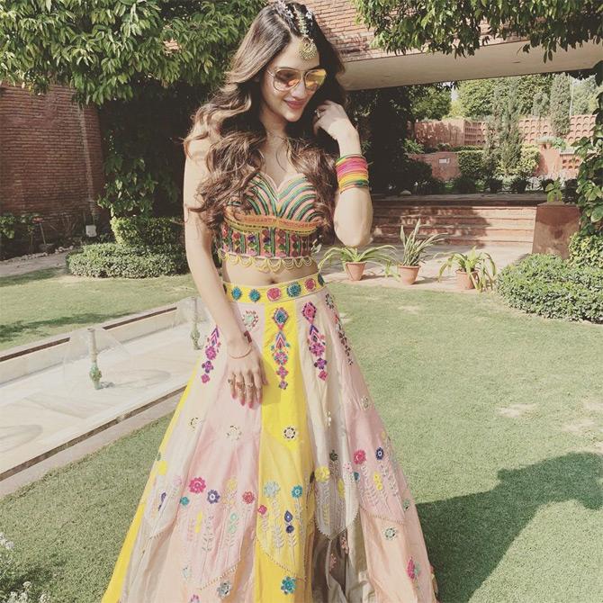 In photo: Nusrat Jahan gets sunkissed as she is caught in a candid moment during her friend's wedding