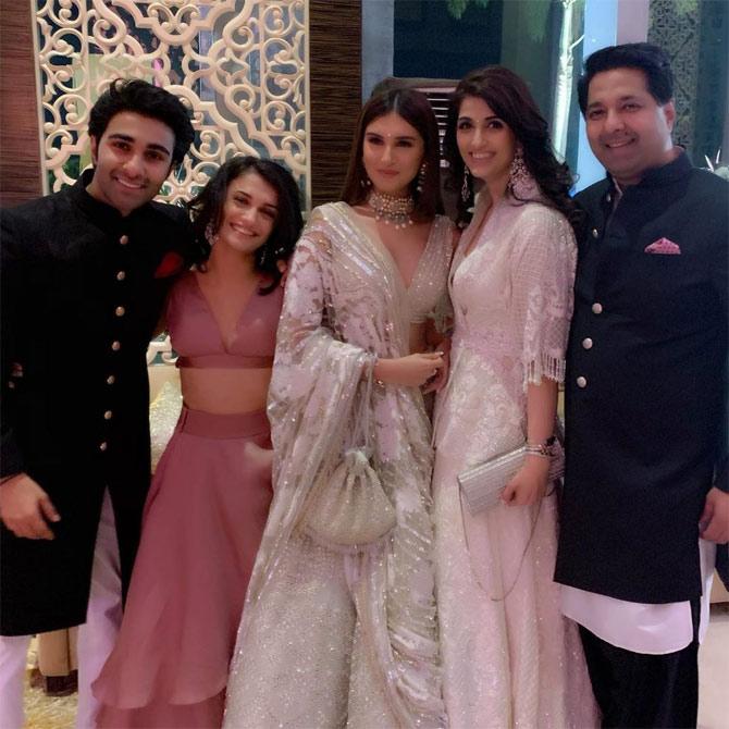 Aadar Jain posed with rumoured girlfriend Tara Sutaria and her twin sister Pia Sutaria at the wedding reception.