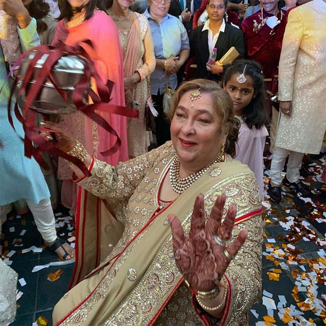 Rima Jain, Armaan Jain's mother was clicked having a gala time at the baaraat. The elated mother of the groom danced to the tunes of the dhol during the wedding ceremony. Adorable, isn't it?