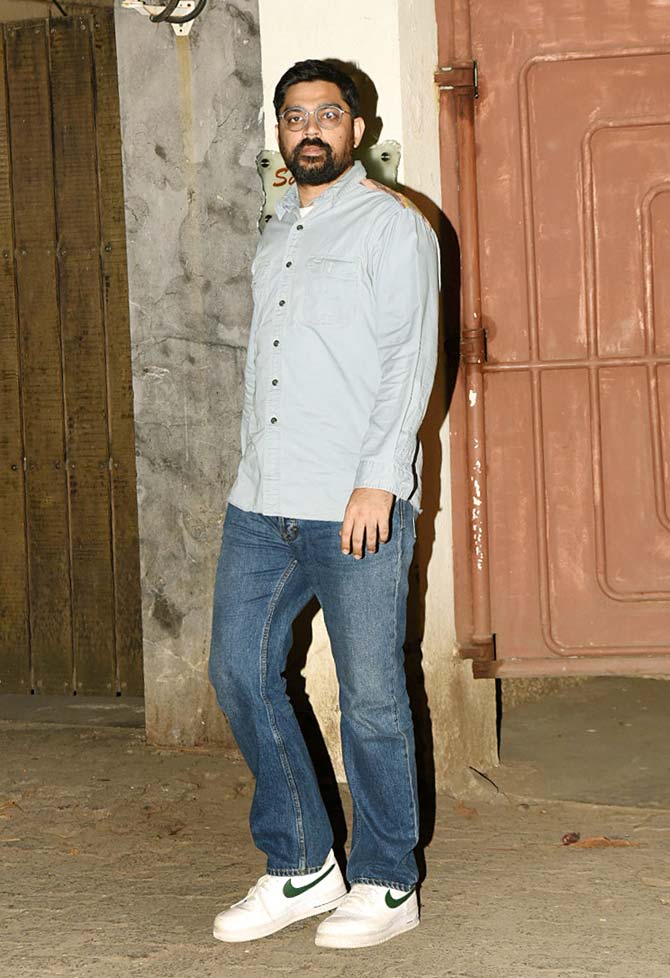 The makers of Malang hosted a grand screening of their film at a popular studio in Juhu, Mumbai. Several B-town celebrities attended the screening including filmmaker Karan Boolani who appeared in his casual avatar - blue shirt and denim for the event. All pictures/Yogen Shah 