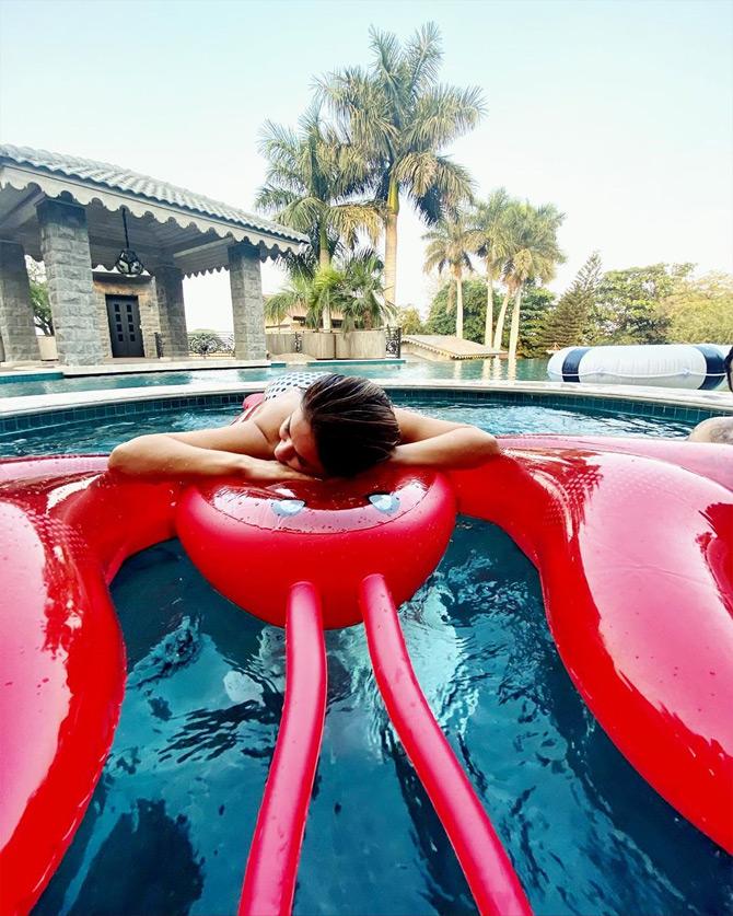 Mumbai socialite Natasha Poonawalla has been setting the internet on fire with her chic, glam and fabulous fashion choices. But there's much more to her than just being a socialite and a philanthropist. Natasha has a soft corner for all things blue. Be it spending time by the pool and soaking in the sun at exotic beaches
In photo: Natasha Poonawalla kickstarts her weekend by spending time in the pool
