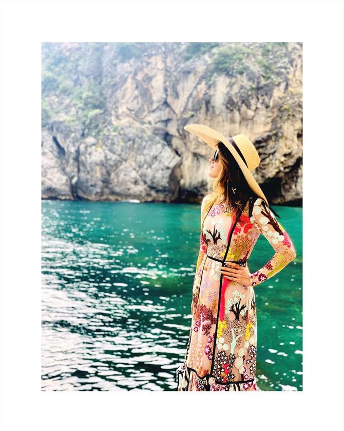 Sharing a throwback picture from the Summer of 2019, Natasha Poonawalla can be seen enjoying 'Me' time in the beautiful town of Positano, which is located in the Amalfi Coast in Italy. Donning a beautiful pink and yellow outfit, Natasha can be seen getting sunkissed amidst the stunning backdrop of blue waters of Positano