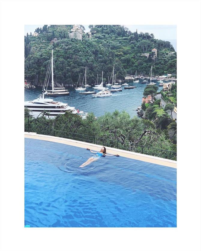 Raising the temperature in a monokini, Natasha Poonawalla can be seen enjoying the chilled waters of a pool as she flaunts her swimming skills. While sharing this stunning picture of herself, Natasha wrote: Checked out!
