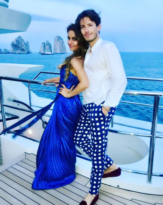 Natasha shared this picture while she was attending an award ceremony with her friend Edgardo Osorio in New York, USA. Taking her love for all things blue one notch higher, Natasha can be seen donning an all-blue ensemble as she poses on the cruise amidst the backdrop of blue sea

