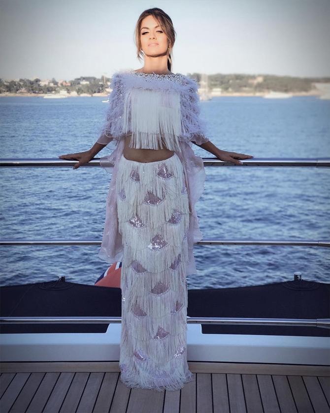 In this photo, Natasha can be seen sporting a beautiful dress as she enjoys the beauty of French Riviera, which is known for its glamour and beauty all across the globe. In the picture, Natasha can be seen getting sunkissed as she is all set for Cannes 2017

