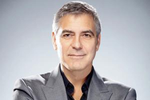 Is George Clooney interested in buying Spanish football club Malaga?