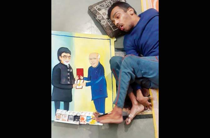 Kundal paints with the toes of his left foot