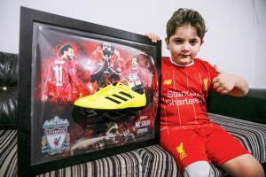 Mohamed Salah gifts signed boot to child who lost leg in Syria bombings