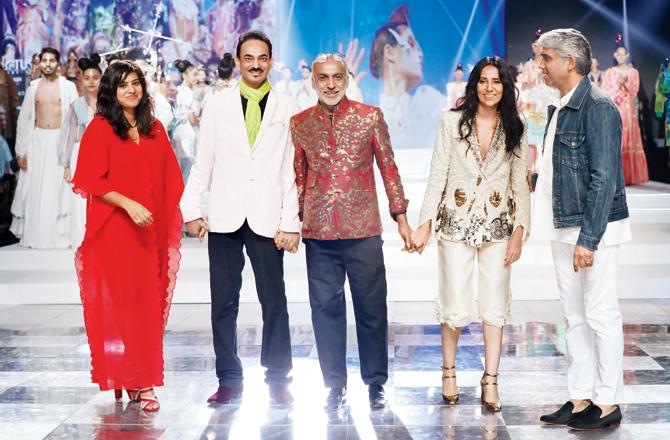 Schulen Fernandes, Wendell Rodricks, Manish Arora, Anamika Khanna and Rajesh Pratap Singh take a bow after the finale show in 2012. Pic/Getty Images